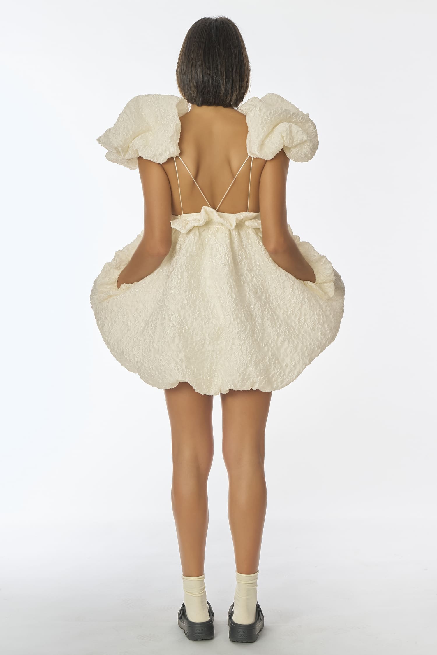 Detailed backless mini wedding dress with thin criss-cross straps, Raeira gown - Anabel Santos - Haute Couture - Galicia