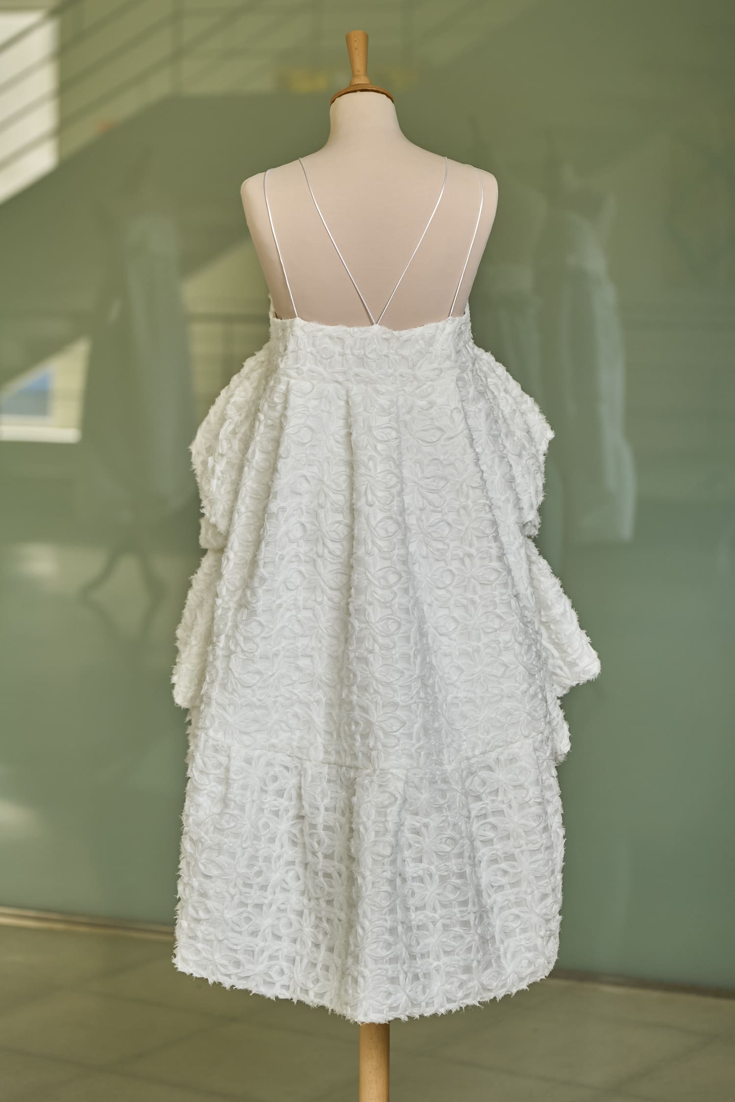 Detailed backless wedding dress with thin criss-cross straps, Celea gown - Anabel Santos - Haute Couture - Galicia