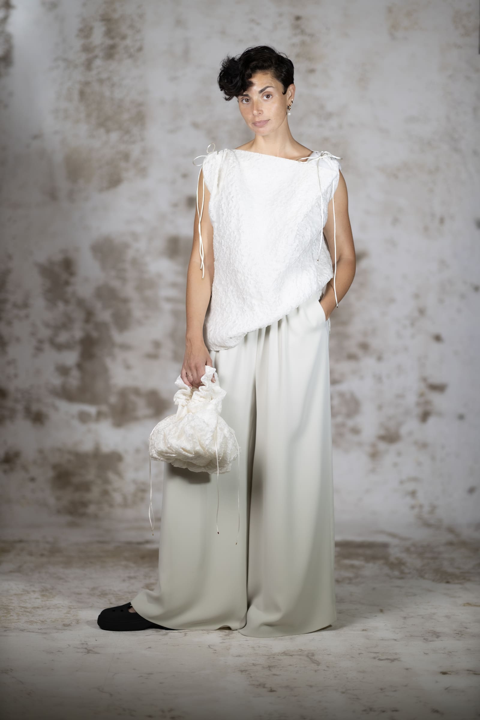 Full-body shot of the Raiola blouse, an extraordinary minimalist top in premium silk jacquard with a luminous and brilliant finish - Anabel Santos