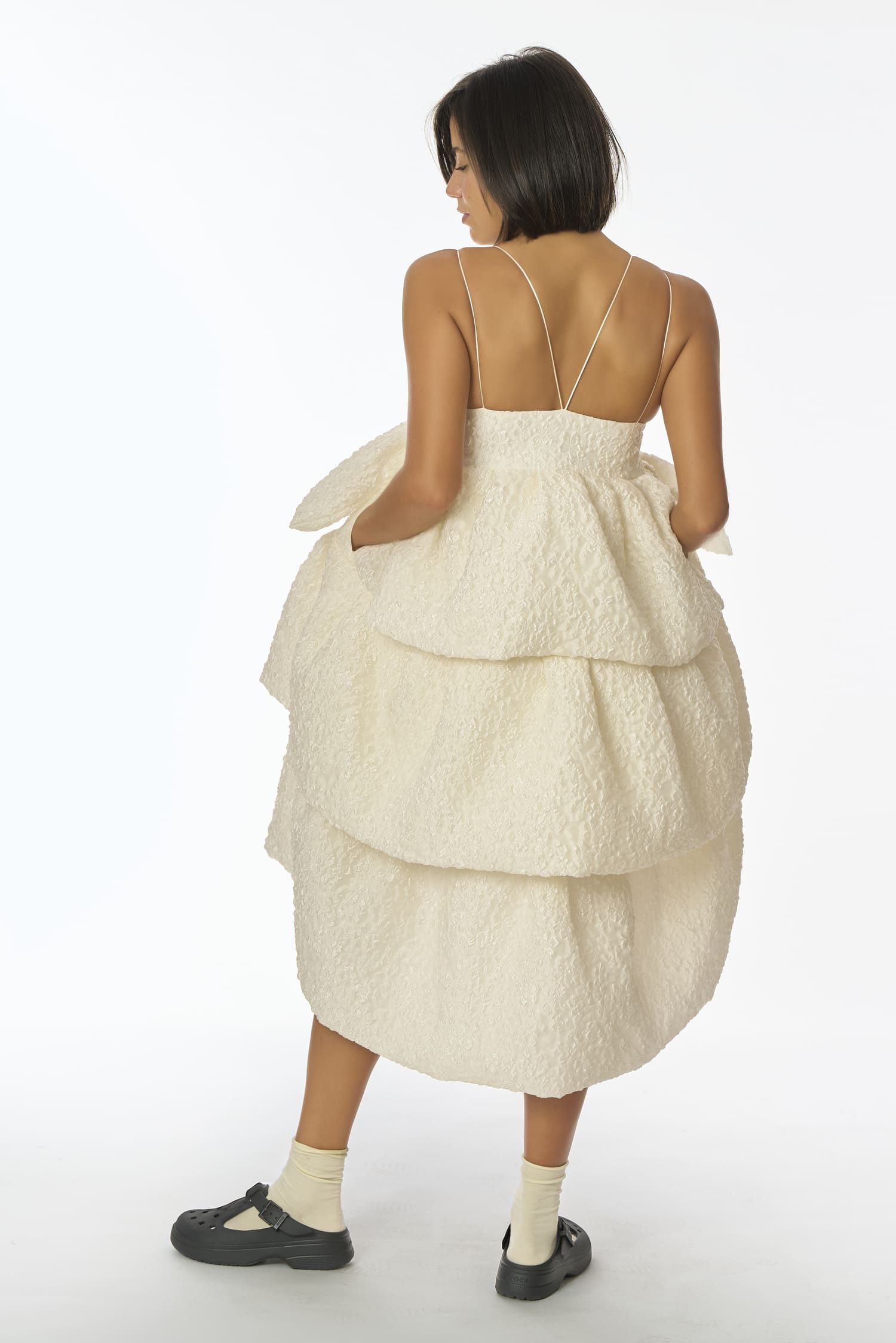 Detailed backless ivory wedding dress with thin criss-cross straps, Leda gown - Anabel Santos - Haute Couture - Galicia